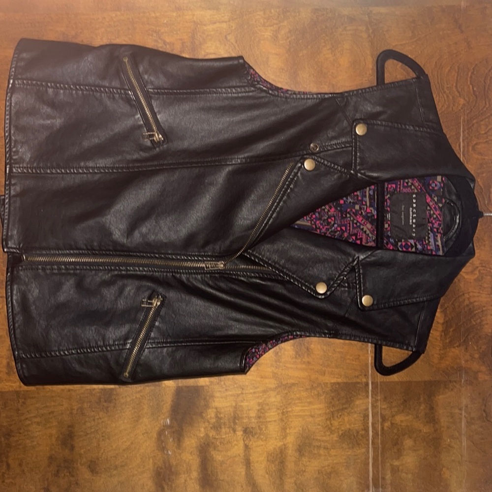 Very cute leather vest